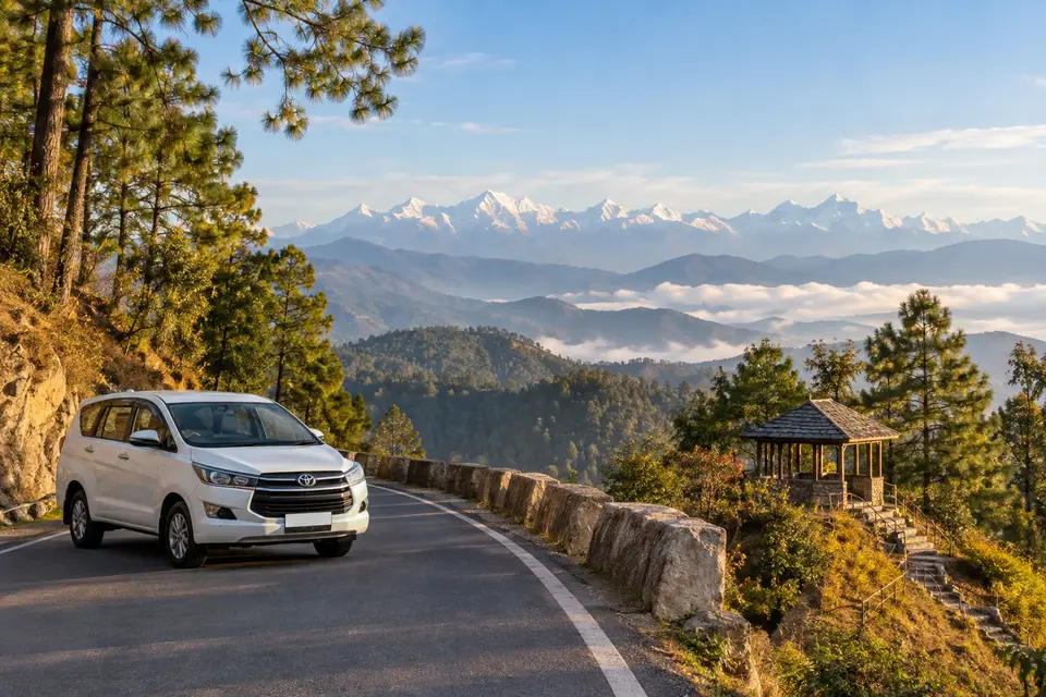 Delhi to Kanatal car rental with driver